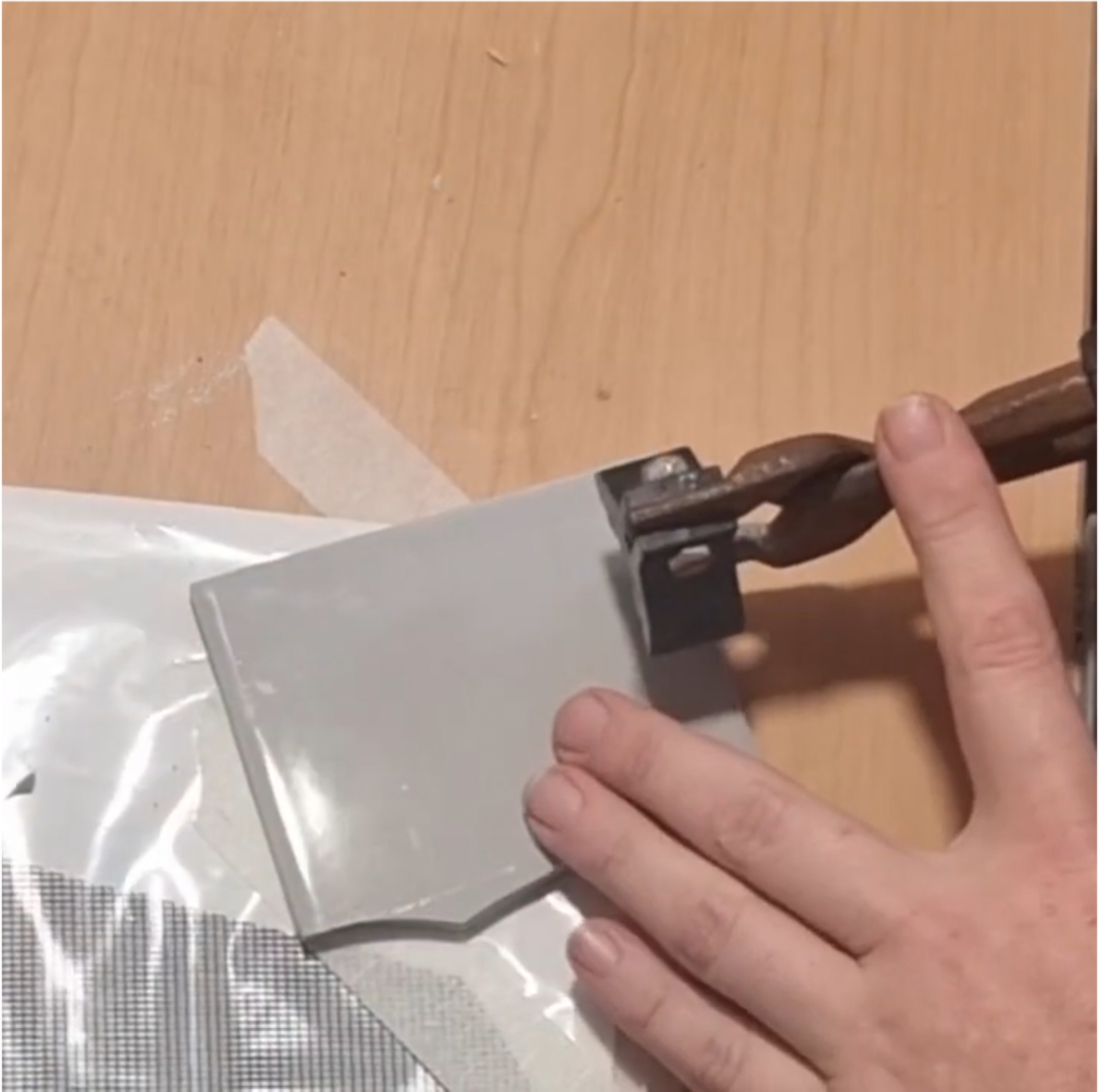 Load video: Close-up ASMR video of grey tiles being precisely cut for the Sad Clown mosaic on 29 July 2025. Sharp tile-snapping sounds and smooth tool movements highlight the relaxing mosaic-making process.