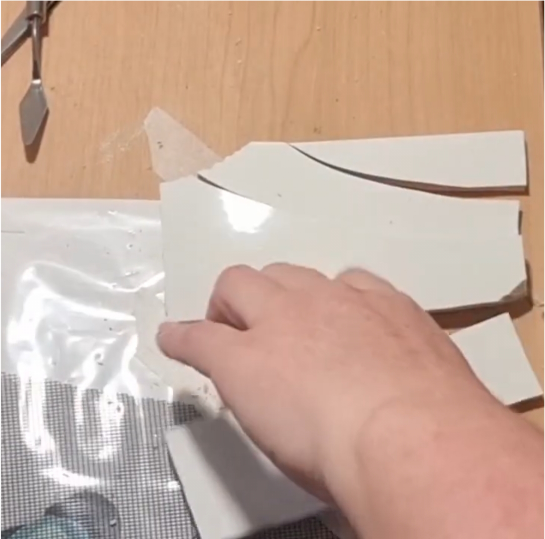 Load video: Close-up ASMR video of white background tiles being neatly cut for the Custom Daisy mosaic on 29 July 2025. Crisp tile-snapping sounds and steady tool movements create a soothing, detailed look at the mosaic process.