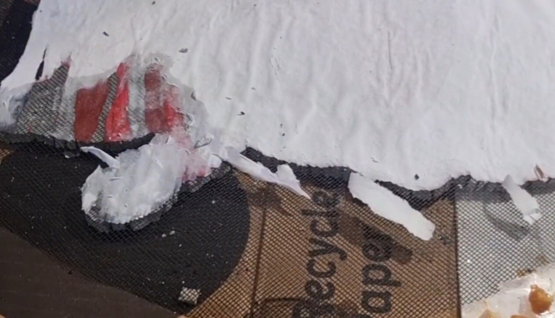 Load video: A how to video of me removing paper from back of a mosaic on mesh that I forgot to put plastic under.