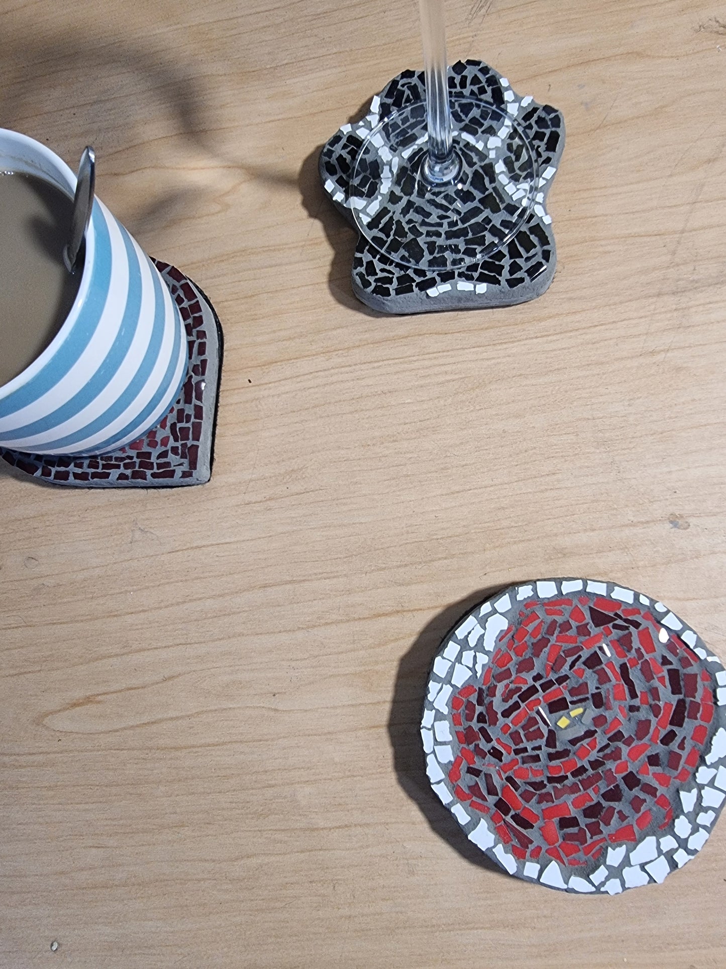 The rose coaster with 2 others behind with cups on them for sale