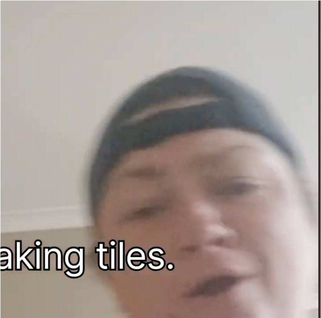 Load video: Playful parody video of Rhianna’s ‘Breaking Dishes,’ reimagined as ‘Breaking Tiles,’ showing the artist humorously cutting and snapping mosaic tiles in rhythm to the music.
