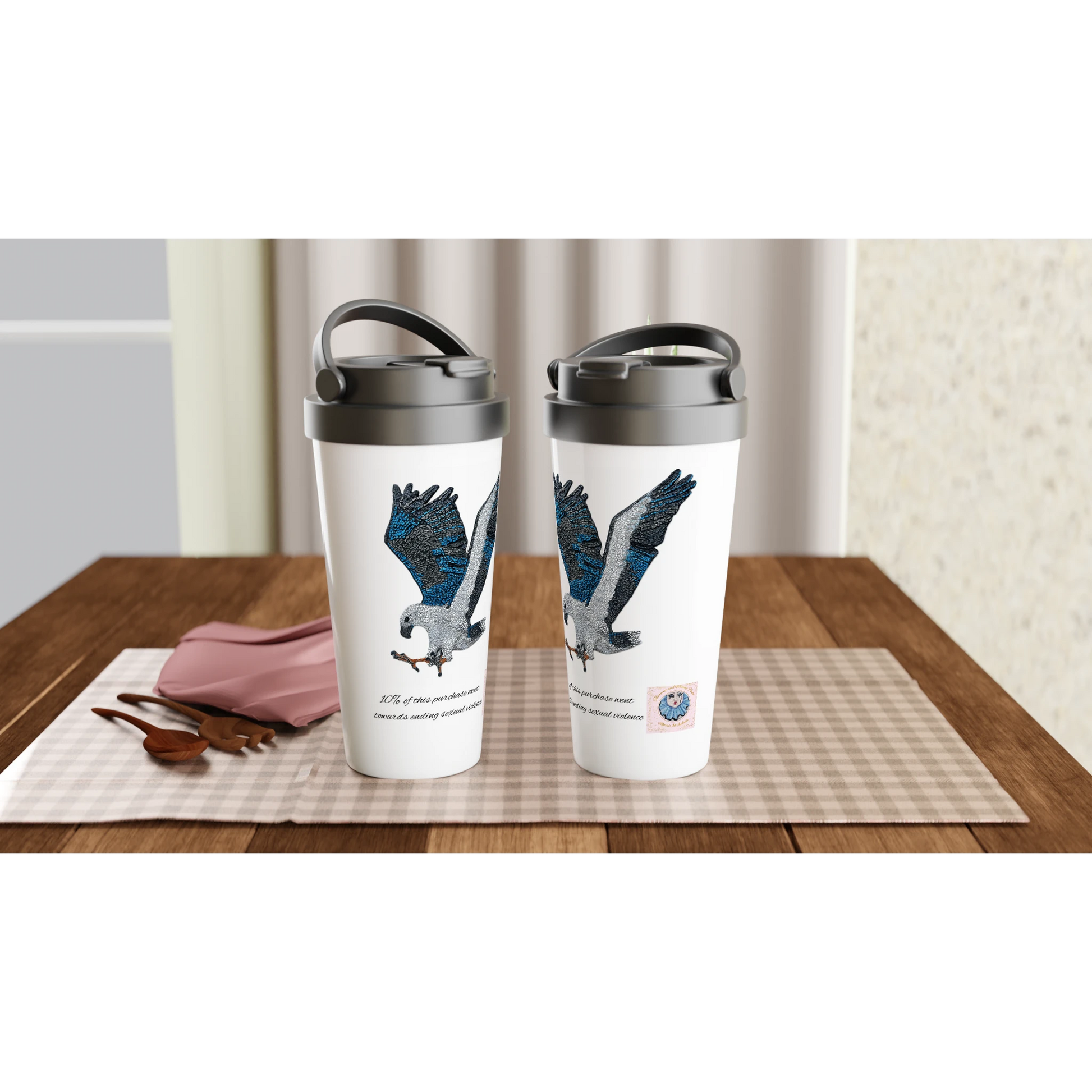 Willow the white-bellied sea eagle mosaic is displayed on 2 Travel mugs on a dining table setup merrins art