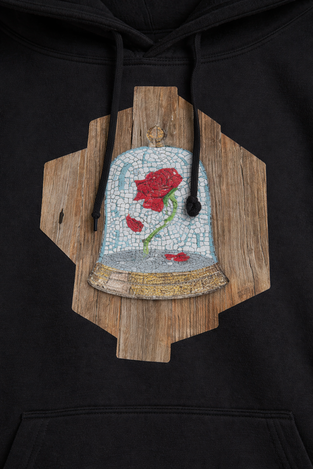 Black hoodie with a wooden cursed rose mosaic design featuring a rose in a glass dome.
