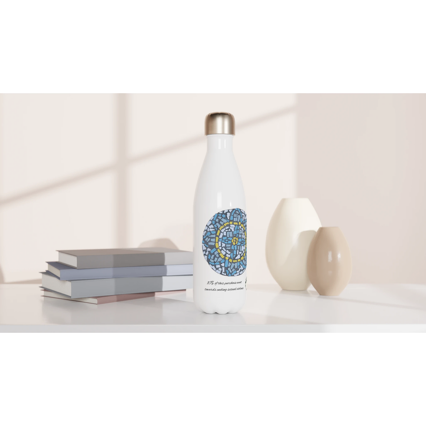 stainless steel water bottle mockup in front of books with mandala coaster mosaic design made in Sebastopol Victoria 