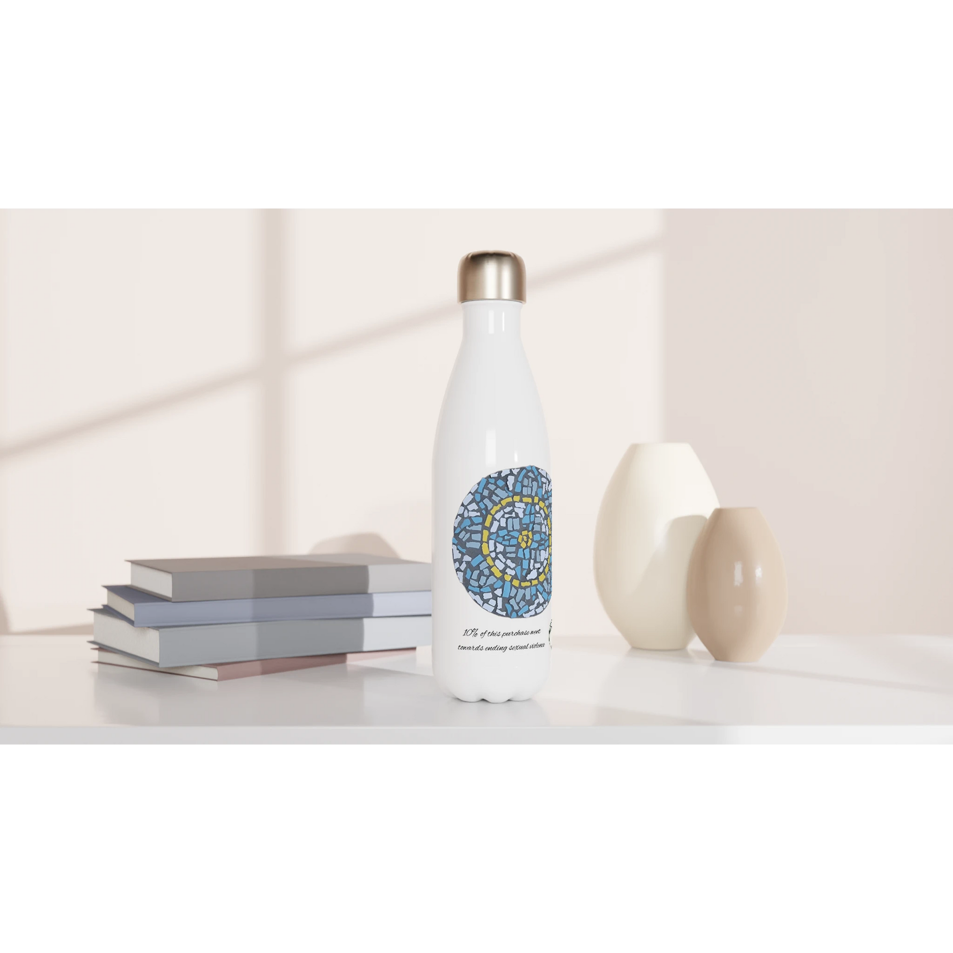 stainless steel water bottle mockup in front of books with mandala coaster mosaic design made in Sebastopol Victoria 