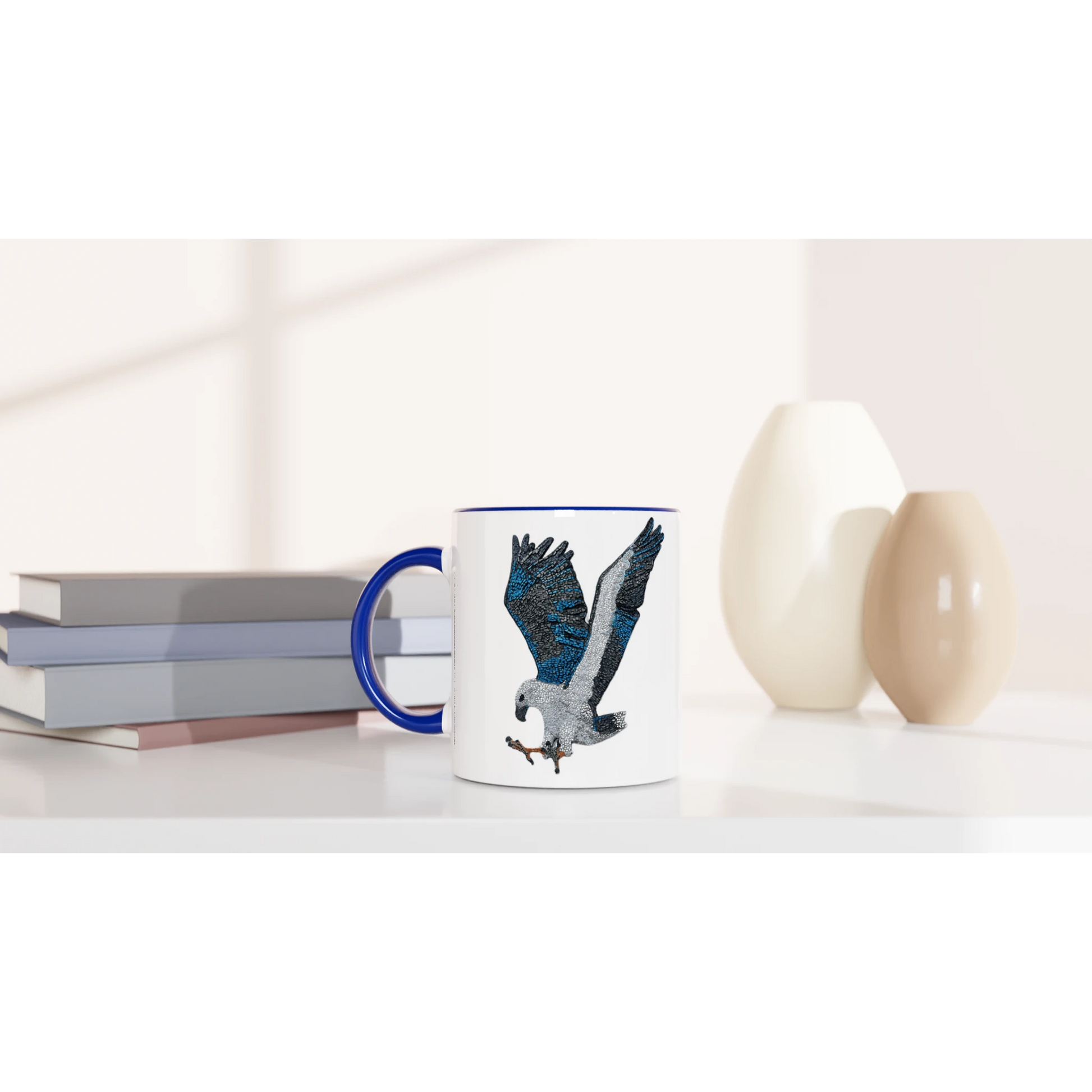 Willow White-bellied Sea Eagle mosaic mug with royal blue handle and blue interior, showing detailed Australian wildlife artwork printed clearly on glossy ceramic.