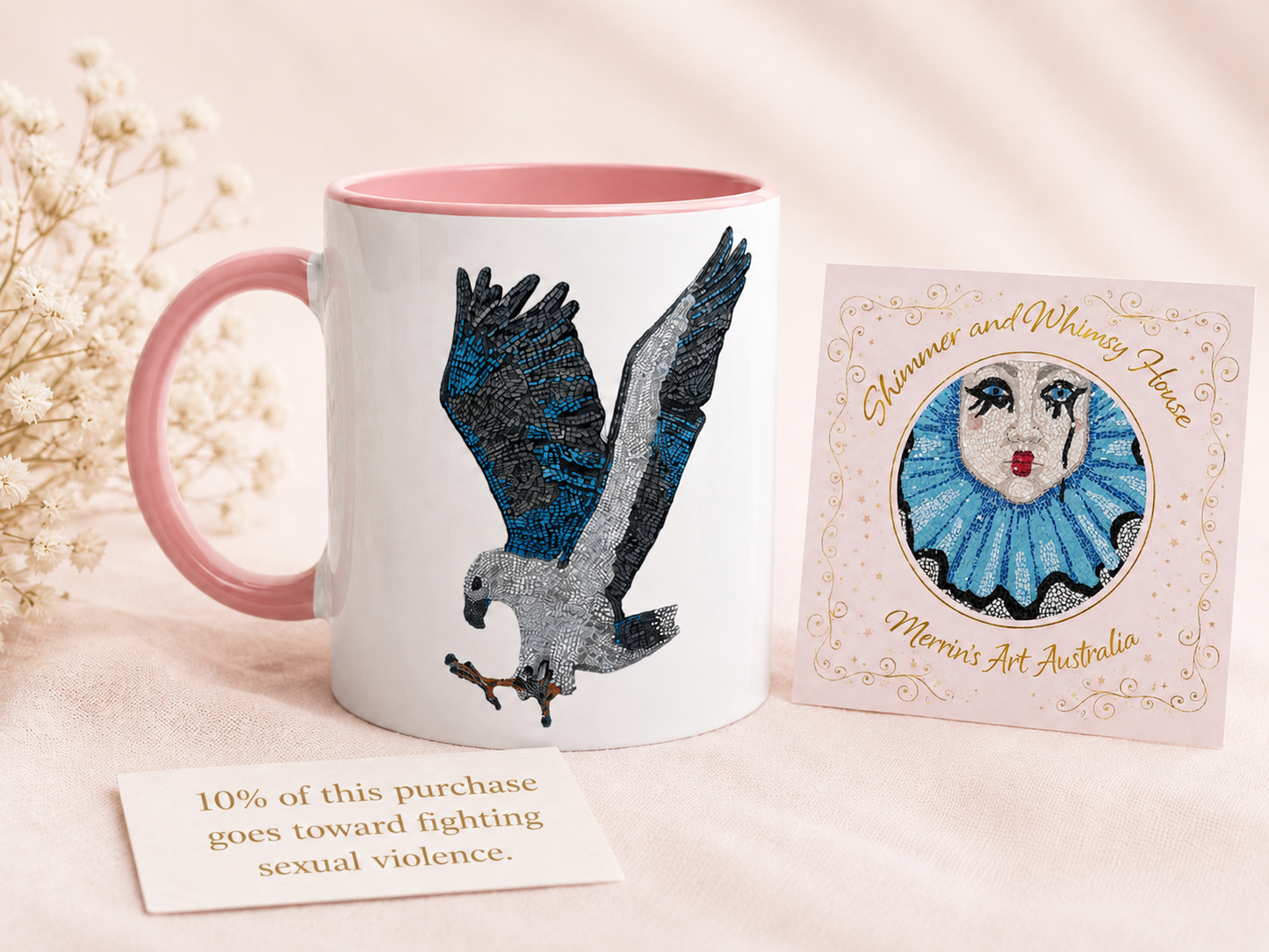 Willow White-bellied Sea Eagle mosaic mug beside Shimmer and Whimsy House branding and a card reading 10% of this purchase goes toward fighting sexual violence.