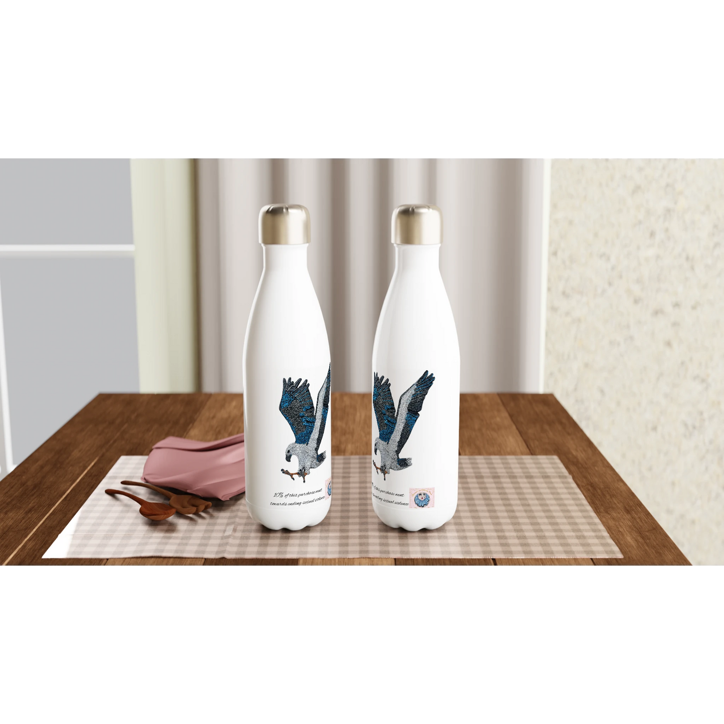 Willow White-bellied Sea Eagle stainless steel water bottle styled on dining table 2 of them